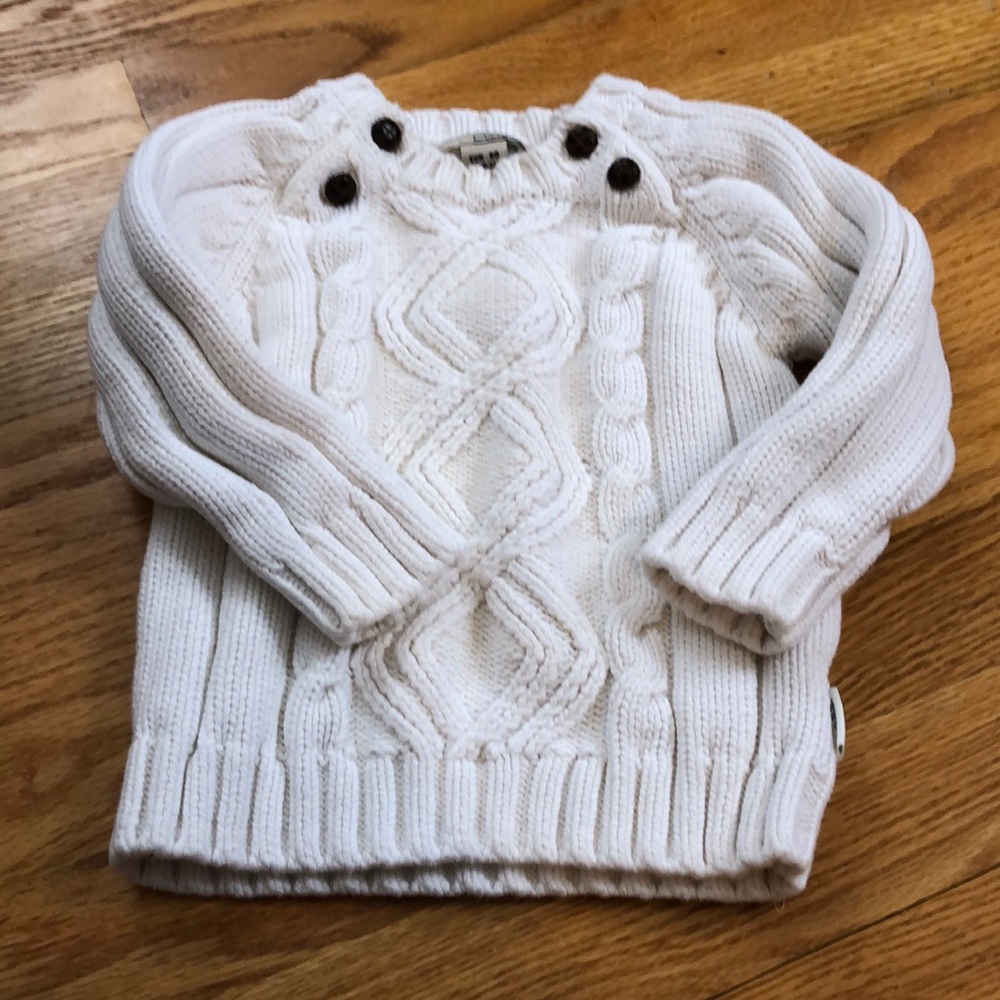 White cable knit sweater